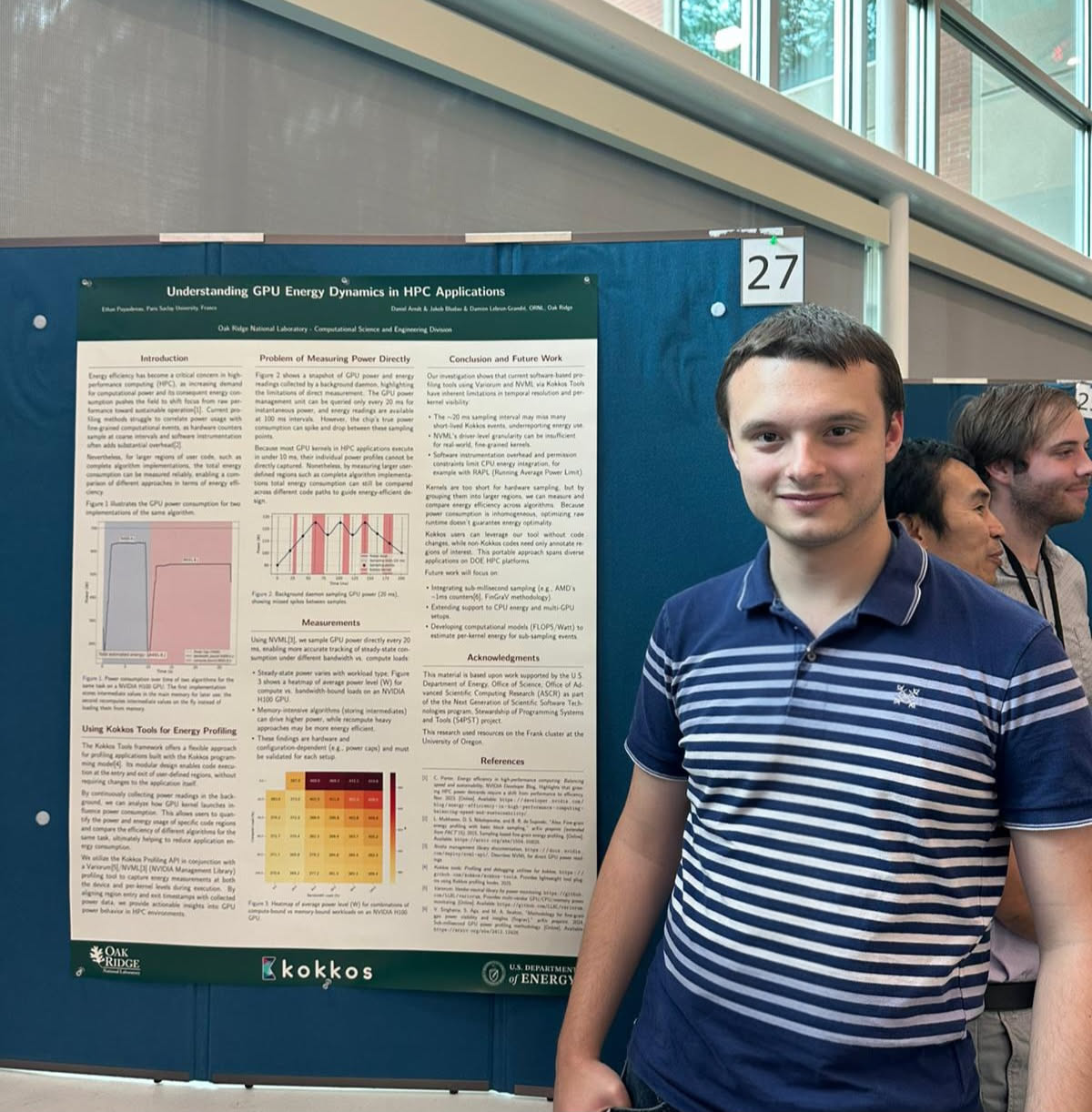 Ethan Puyaubreau standing beside his poster, Understanding GPU Energy Dynamics in HPC Applications, at the Smoky Mountains Conference 2025.